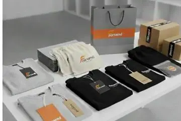 Our Factory Custom branded hangtags and packaging being applied to finished private label apparel.