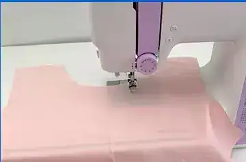 Our Factory ndustrial flatlock sewing machines operated by skilled technicians in a clean apparel factory.